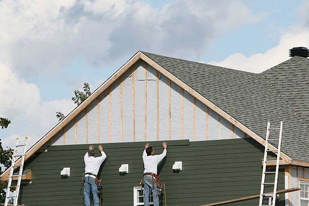 Professional Siding Contractor technician working in Felton, PA